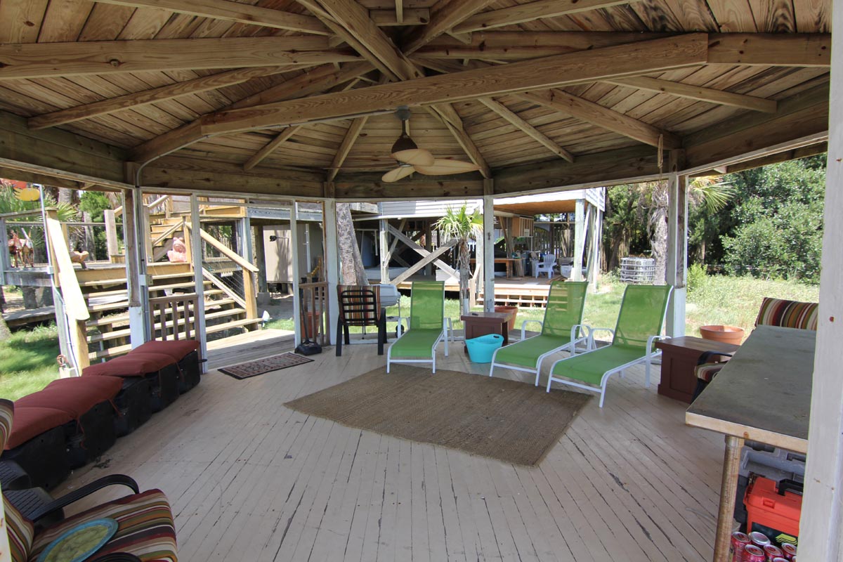 Shaded gazebo lounge with sun chairs on Goat Island