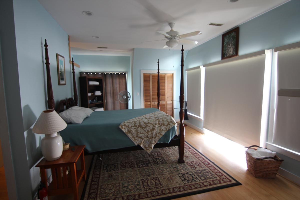 Spacious four-poster bedroom at Goat Island Resort Rental House